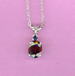 Silver w/ 2.3ct  9x7mm Oval MOZAMBIQUE GARNET w/ 2mm  BLUE SAPPHIRE Accent On 18"S/S Chain