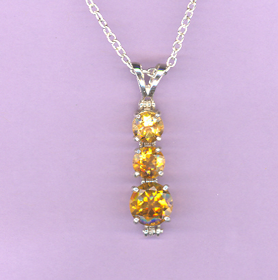 Silver 3 Stone CITRINE  Pendant featuring: 2-8x6mm, 1.2ct,  and 1-10x8mm 2.6ct CITRINES on an 18" Silver Chain