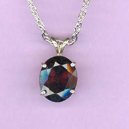 Silver w/ 5.0ct  12x10mm Oval  MOZAMBIQUE GARNET on an  18" Silver Chain