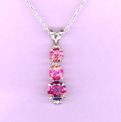 Silver 3 Stone PINK  TOPAZ Pendant featuring: 2-6mm, 1.0ct,  and 1-8mm 2.3ct PINK  TOPAZ on an 18" Silver Chain