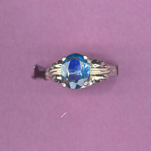 Silver Ring w/ 2.3ct 9x7mm Swiss Blue Topaz